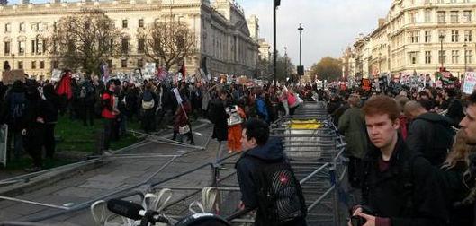 Students tore down police barricades to occupy parliament square